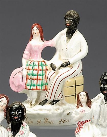 Appraisal: Staffordshire polychromed figural group of Uncle Tom and Eva second