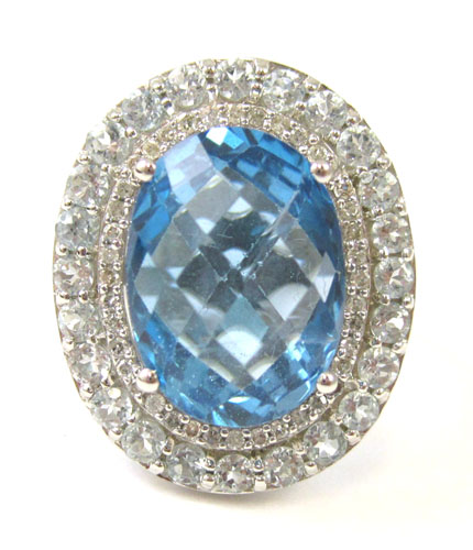 Appraisal: BLUE TOPAZ AND DIAMOND RING IN K WHITE GOLD mount