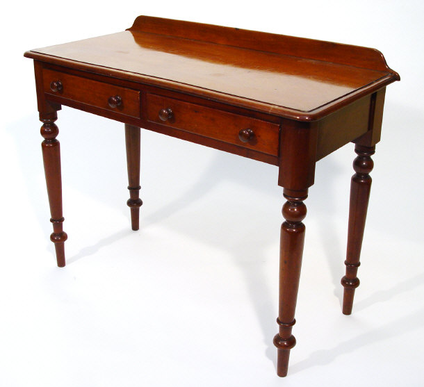 Appraisal: Victorian mahogany hall table fitted with two drawers with bun