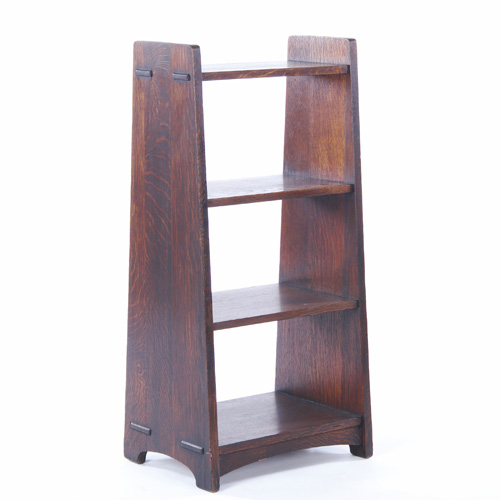 Appraisal: L J G STICKLEY Trapezoidal magazine stand with four shelves