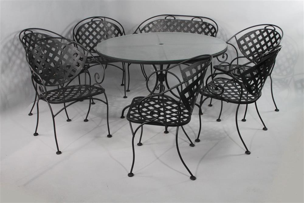 Appraisal: BLACK WROUGHT IRON GARDEN SET INCLUDING CIRCULAR DINING TABLE SIX