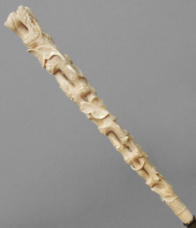 Appraisal: VICTORIAN CARVED IVORY HANDLE PARASOL Folding parasol of point de