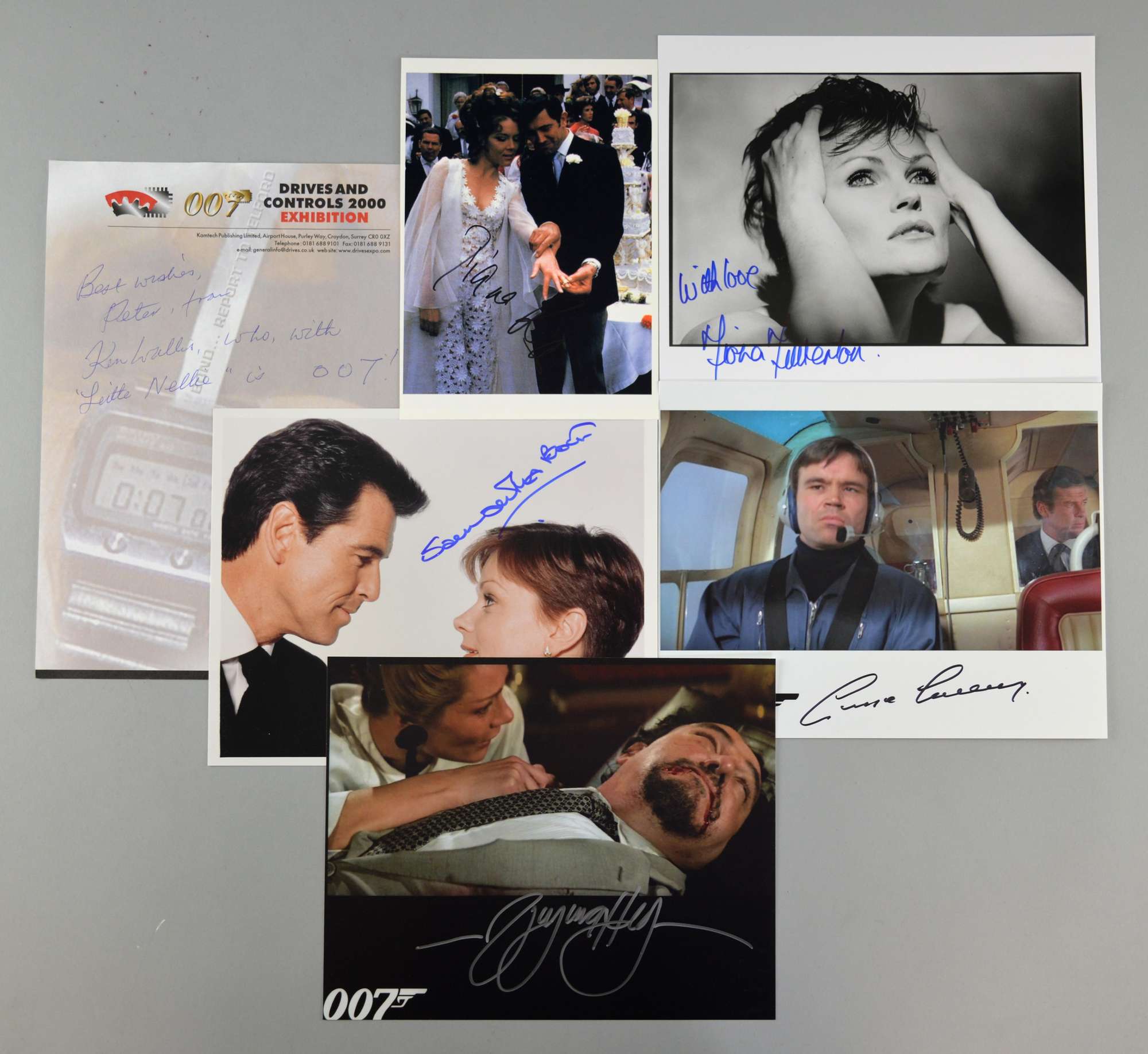 Appraisal: James Bond Six signed photographs pages Diana Rigg Samantha Bond