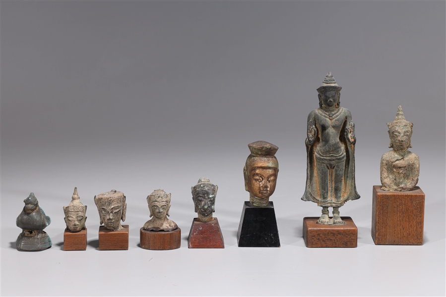 Appraisal: Group of Sino-Tibetan figures and heads all with wood stands