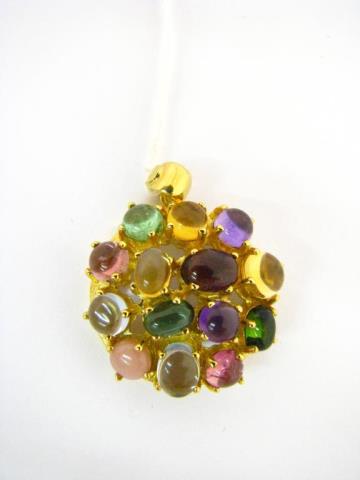 Appraisal: An K yellow gold pendant with multiple cabochon semi-precious stones