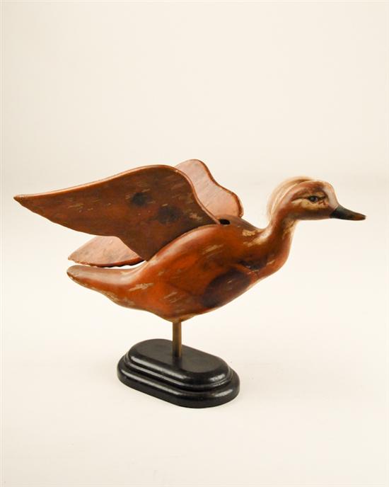 Appraisal: A Carved Wood Duck on Stand partially painted with spread