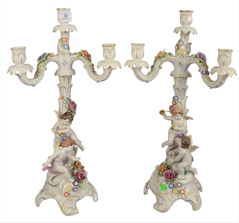 Appraisal: Pair of German Porcelain Candelabras mounted with orange and pink