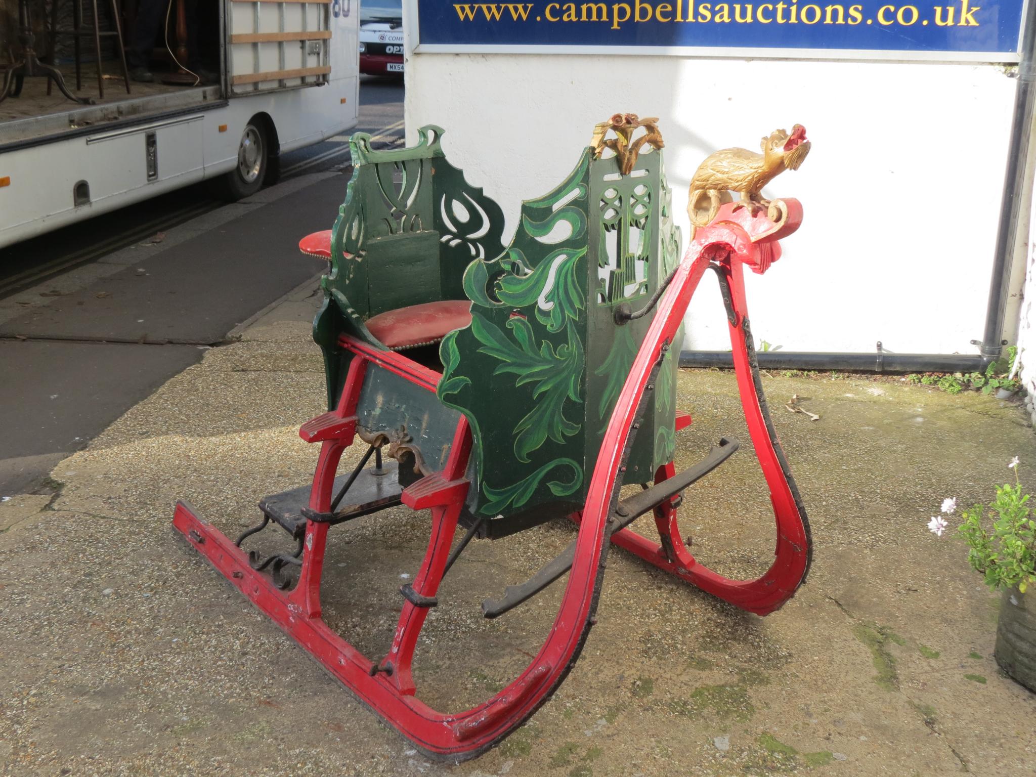 Appraisal: A Scandinavian painted wood sleigh curved frame in red with