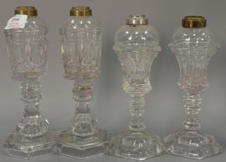 Appraisal: Two pairs of clear glass oil lamps sandwich loop pressed