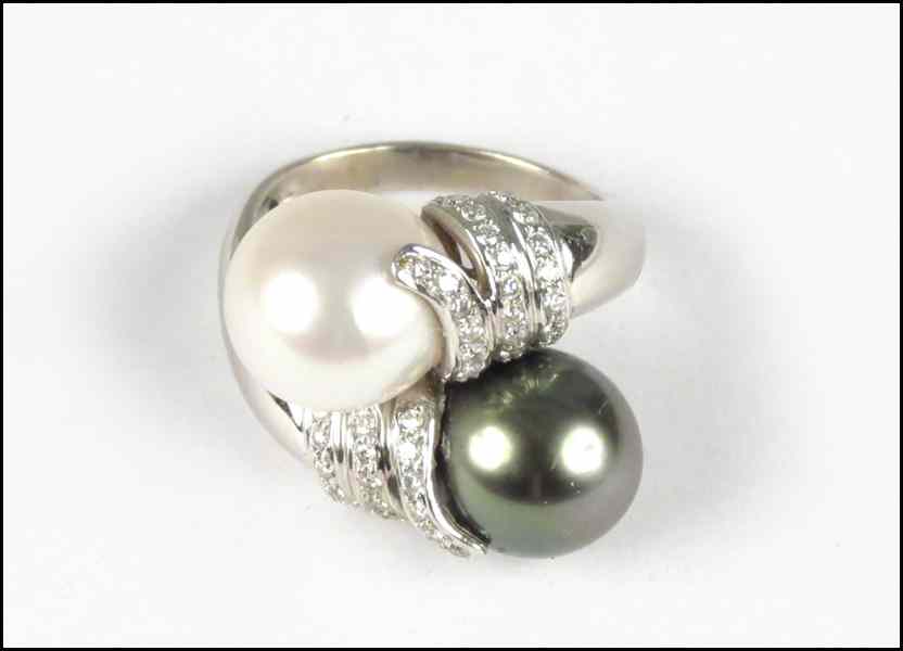 Appraisal: KARAT WHITE GOLD DIAMOND AND PEARL RING Condition No Specific