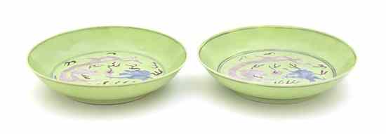 Appraisal: A Pair of Chinese Porcelain Dragon Dishes each having green