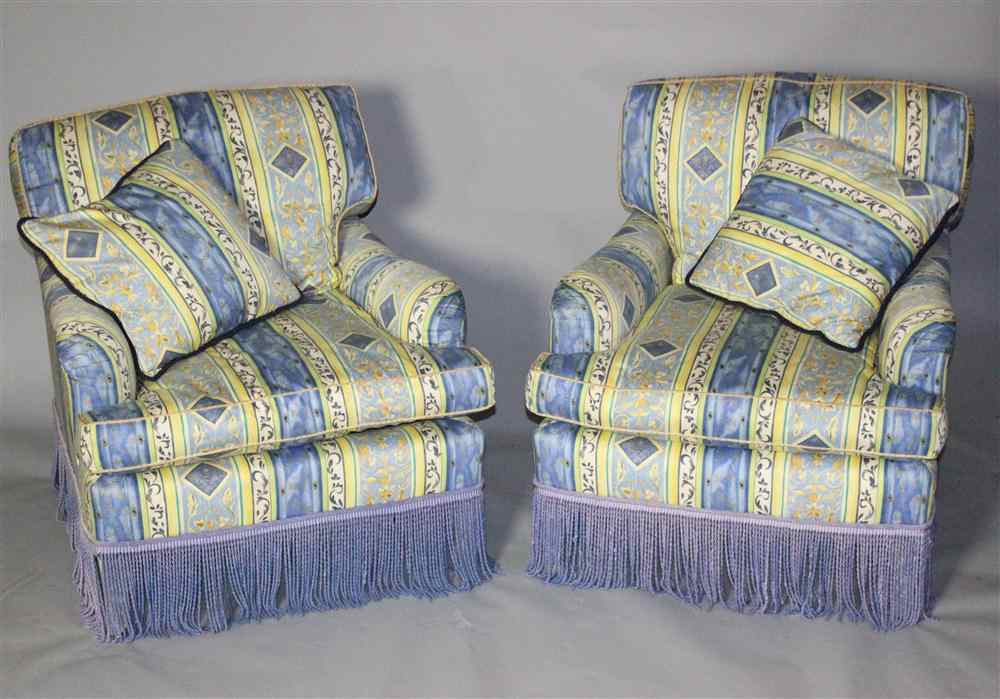 Appraisal: PAIR OF DONGHIA ARM CHAIRS IN A BLUE YELLOW AND