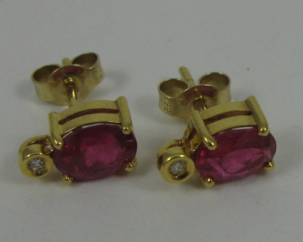 Appraisal: PAIR OF PINK TOPAZ AND DIAMOND EAR STUDS each k