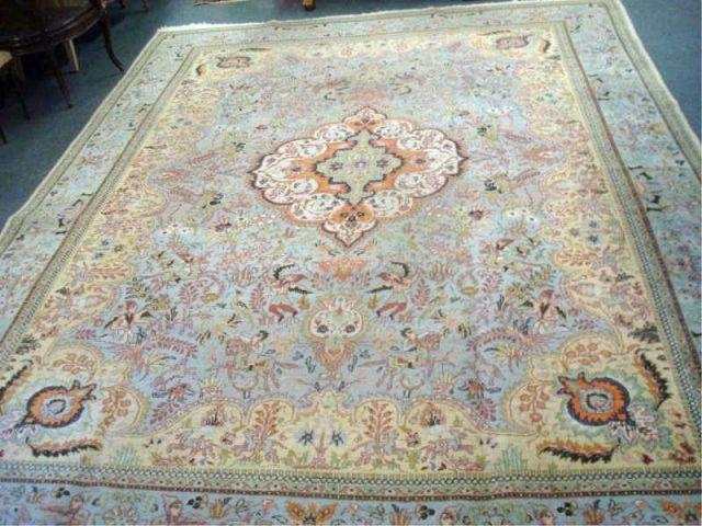 Appraisal: Handmade Heriz Carpet With Center Medallion and Figural Design Dimensions