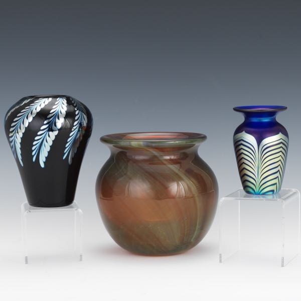 Appraisal: THREE STUDIO ART GLASS VASES One clear fishbowl style bowl