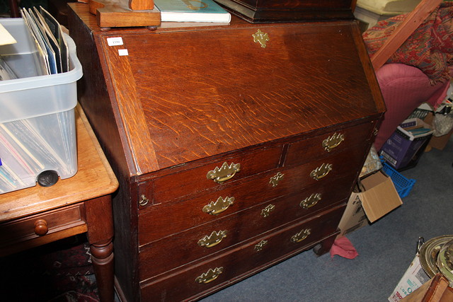 Appraisal: A TH CENTURY OAK BUREAU the fall front opening to