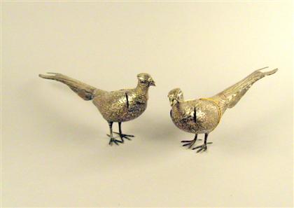 Appraisal: Pair of silver pheasants Each with hinged wings and removable