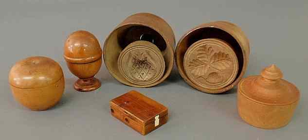 Appraisal: Six pieces of woodware- maple butter molds largest h covered