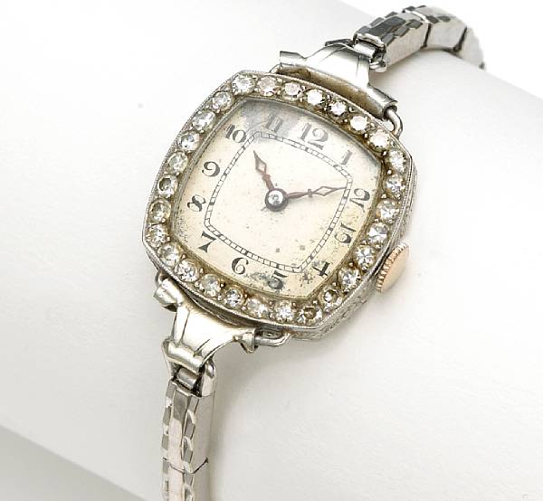 Appraisal: A lady's diamond and platinum watch French a cushion-shape dial