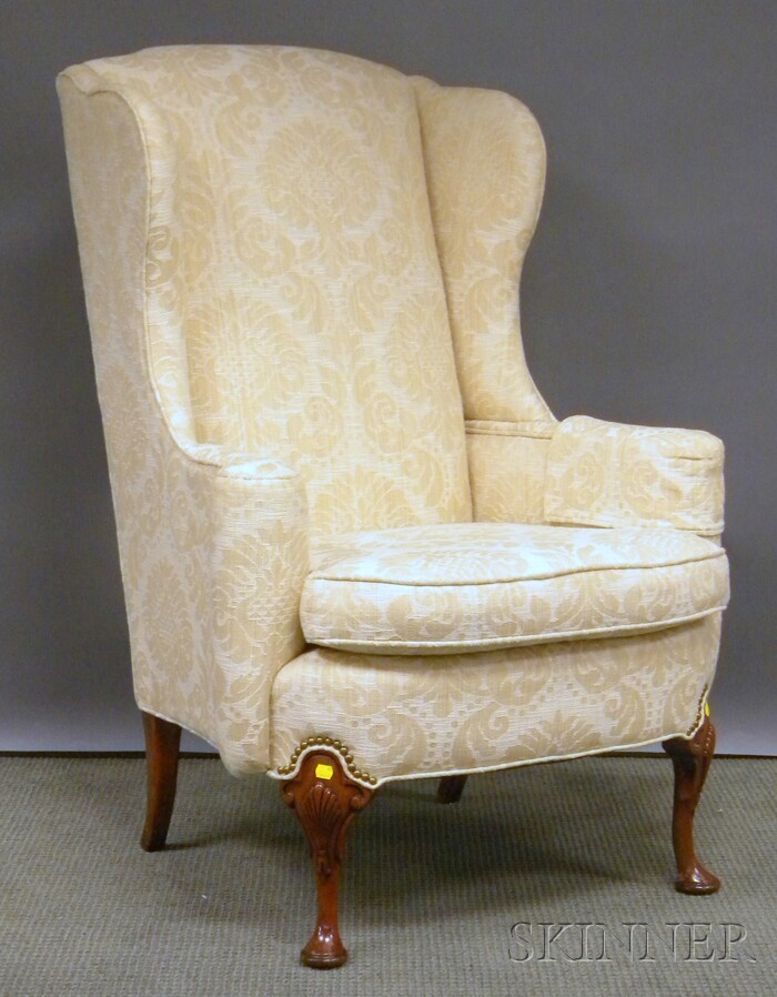 Appraisal: Queen Anne-style Upholstered Carved Mahogany Wing Chair