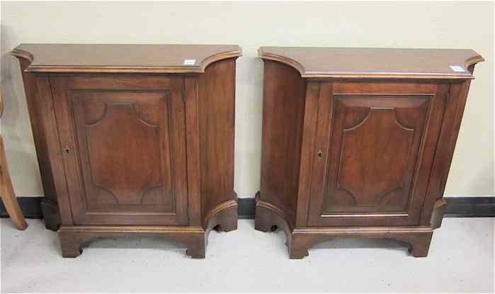 Appraisal: A PAIR OF FEDERAL STYLE MAHOGANY CONSOLE CABINETS Baker Furniture