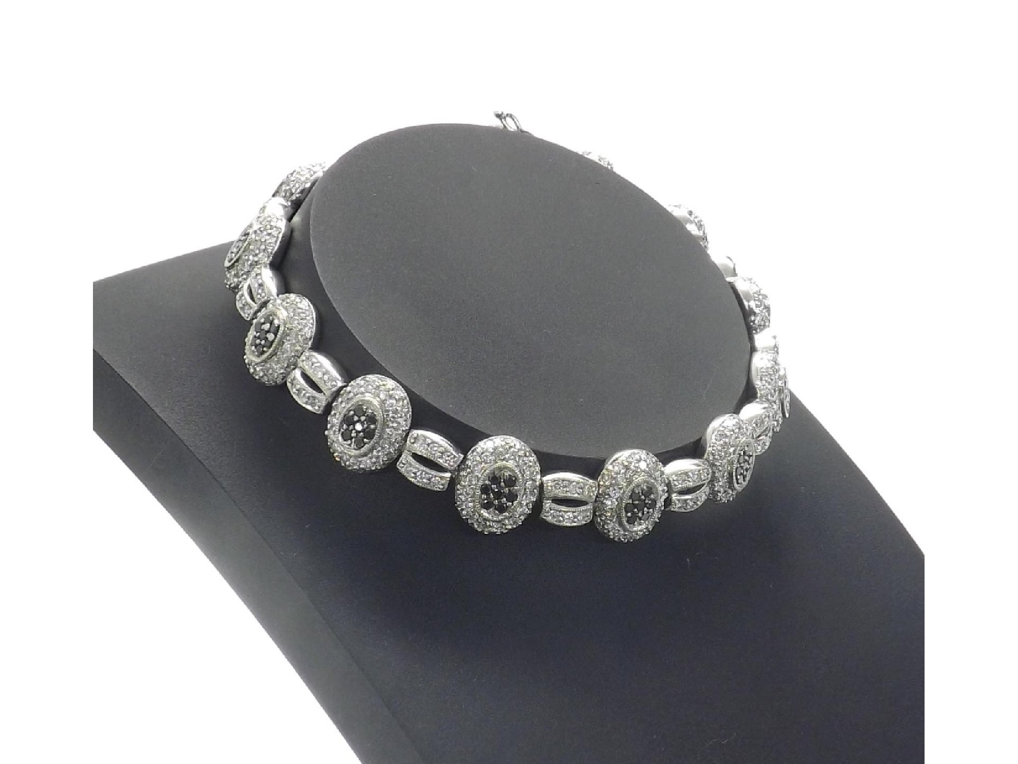 Appraisal: - -a ct white and black diamond set bracelet with