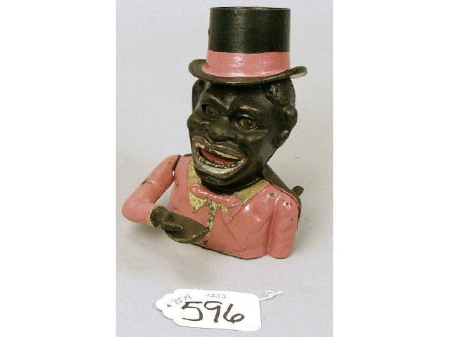 Appraisal: Black memorabilia mechanical bank with repainted areas In good working