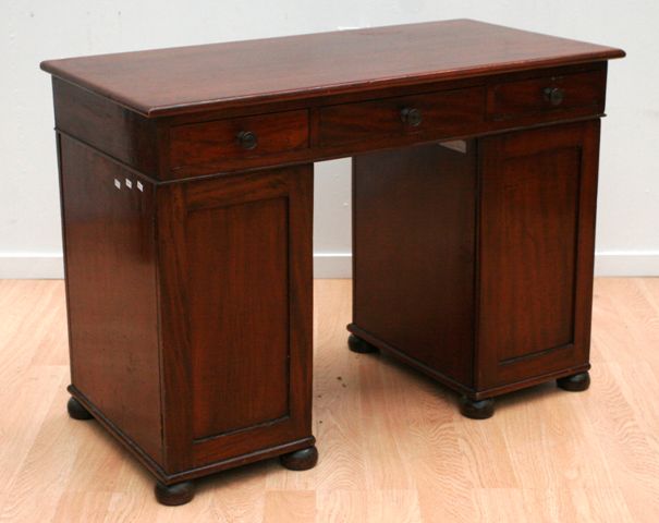 Appraisal: A th century mahogany pedestal desk with later top and