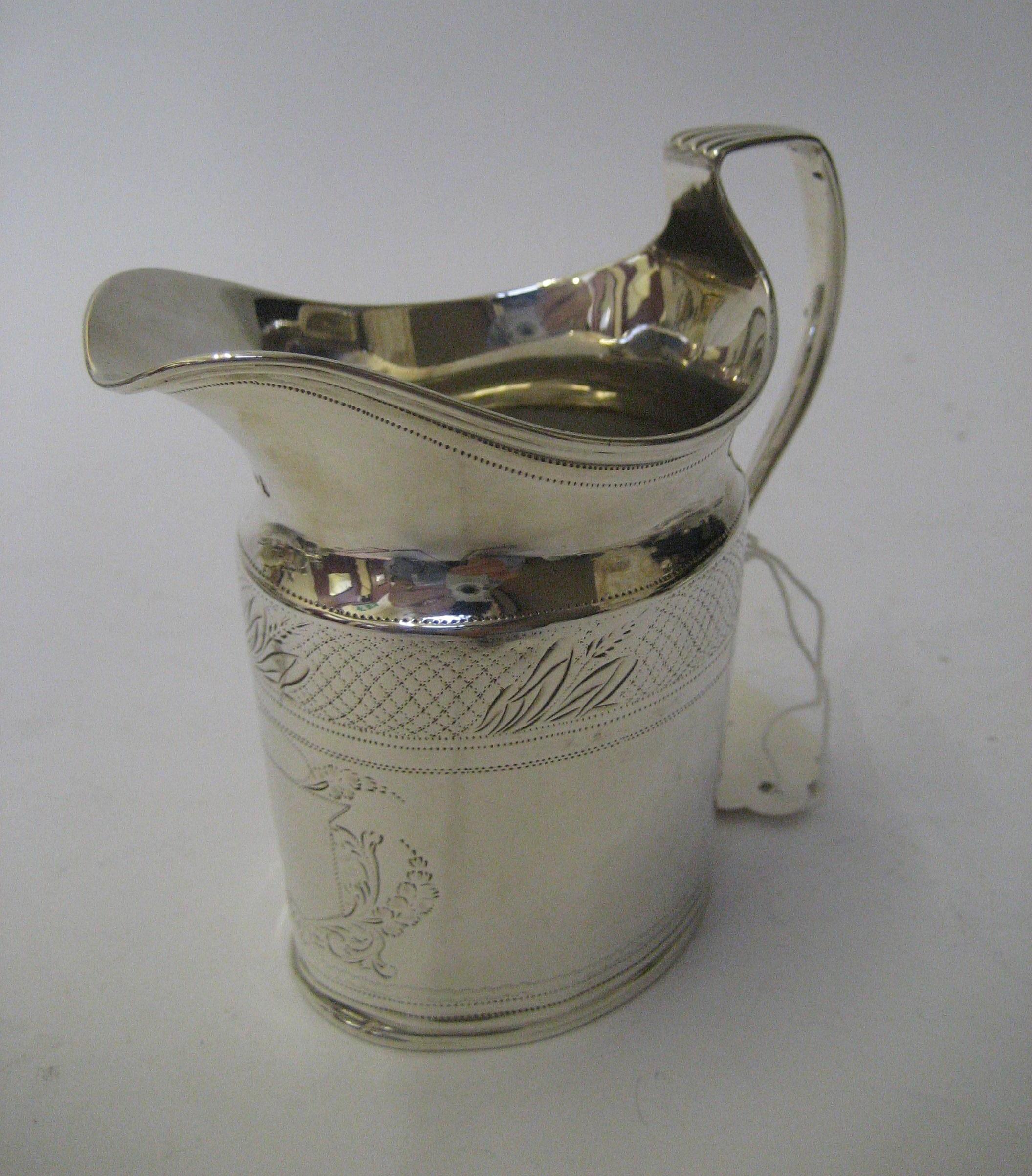 Appraisal: A LATE GEORGE III MILK JUG maker's mark SH London