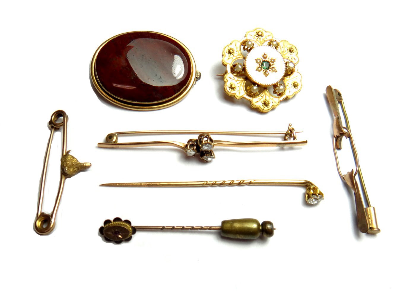 Appraisal: A gold and rose diamond set three stone bar brooch