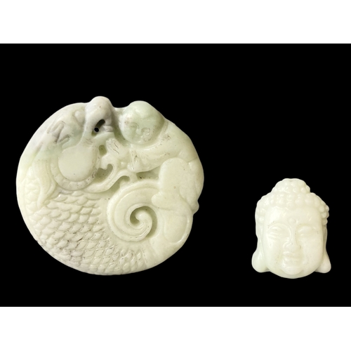 Appraisal: Pair of Chinese carved Jade pendants largest - cm Diameter