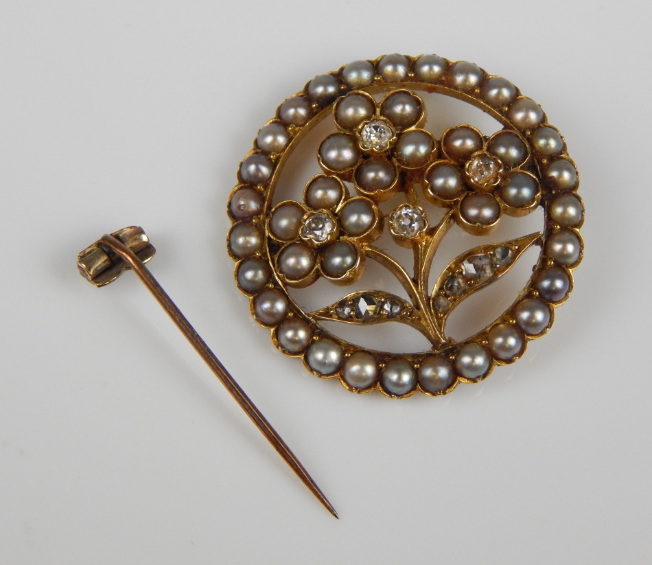 Appraisal: A Victorian seed pearl and diamond circular brooch set with