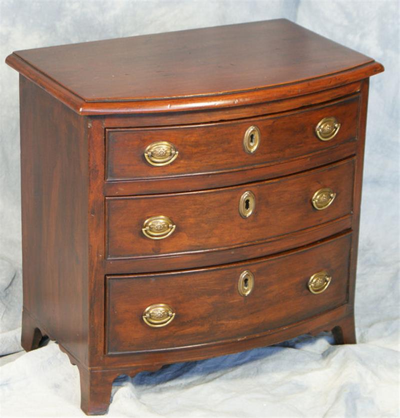 Appraisal: American miniature Hepplewhite drawer bowfront chest on French chest replaced