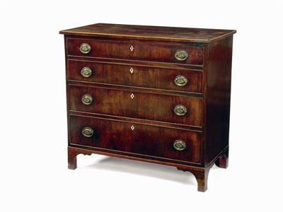 Appraisal: A small mahogany chest with four long graduated drawers fitted