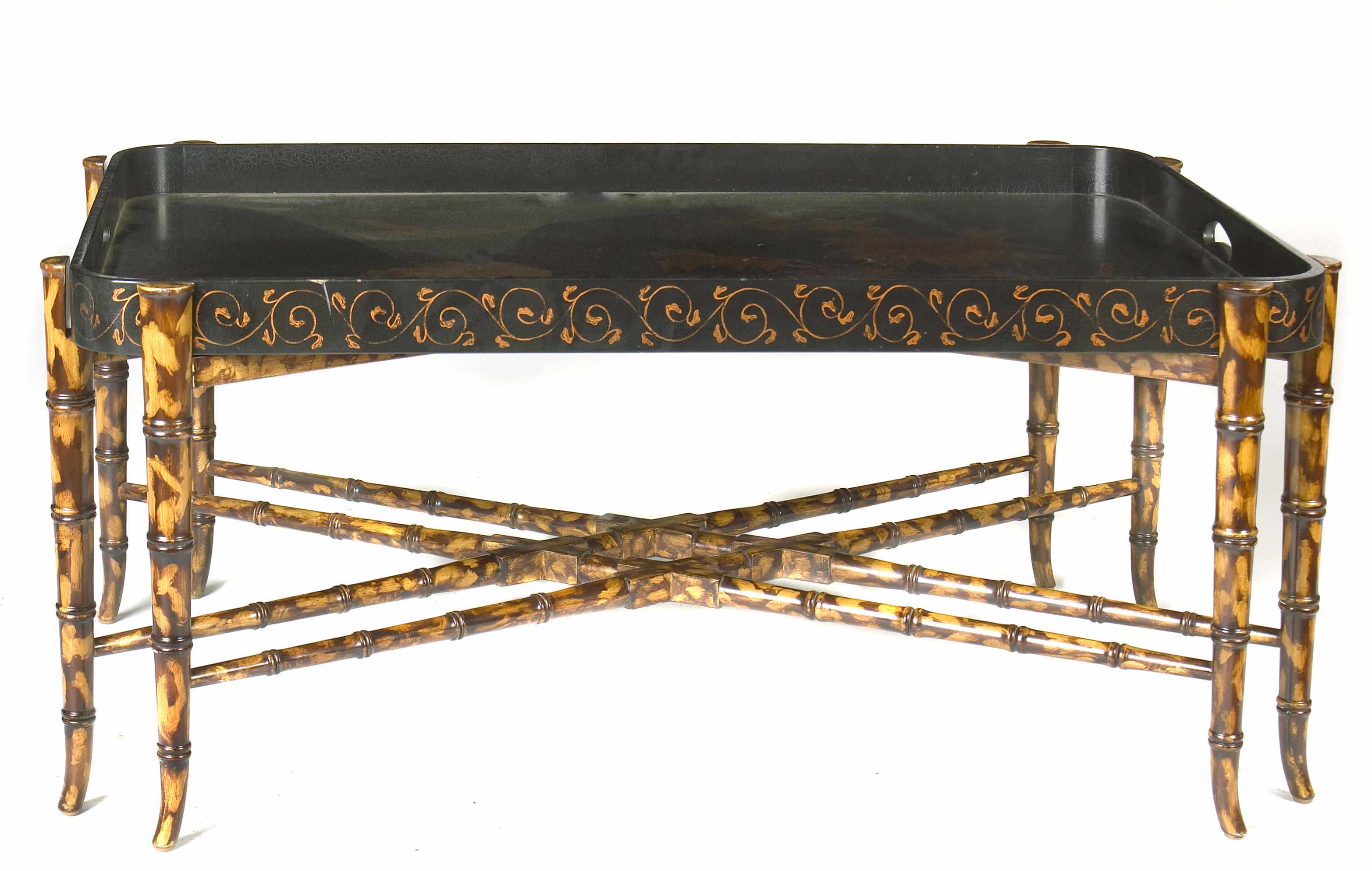 Appraisal: A gilt lacquered coffee table on faux bamboo stand height