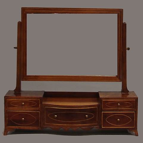 Appraisal: Oblong framed mirror twin raised pedestals small drawers flanking conforming