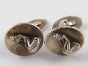 Appraisal: A pair of Danish silver cufflinks marked Sterling Denmark Handmade