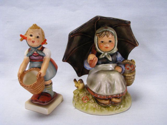 Appraisal: Two Hummel figurines including Smiling Through tall with box Special