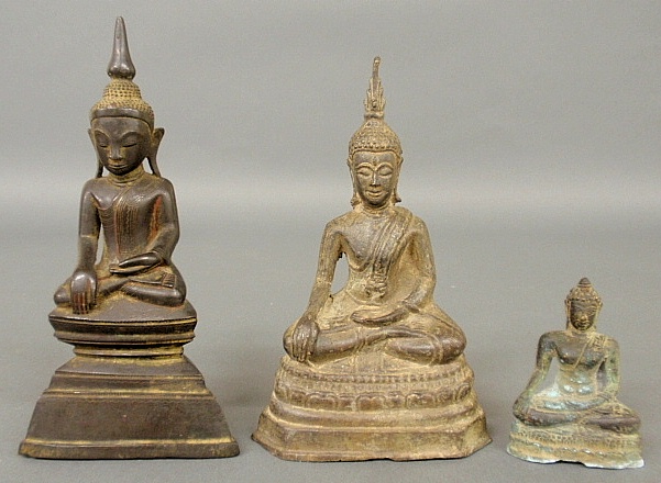 Appraisal: - Three early metal sculptures of Buddha probably th c