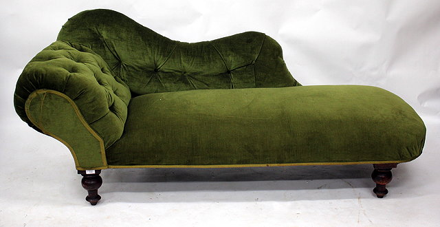 Appraisal: A VICTORIAN CHAISE LONGUE with a rolled end and on