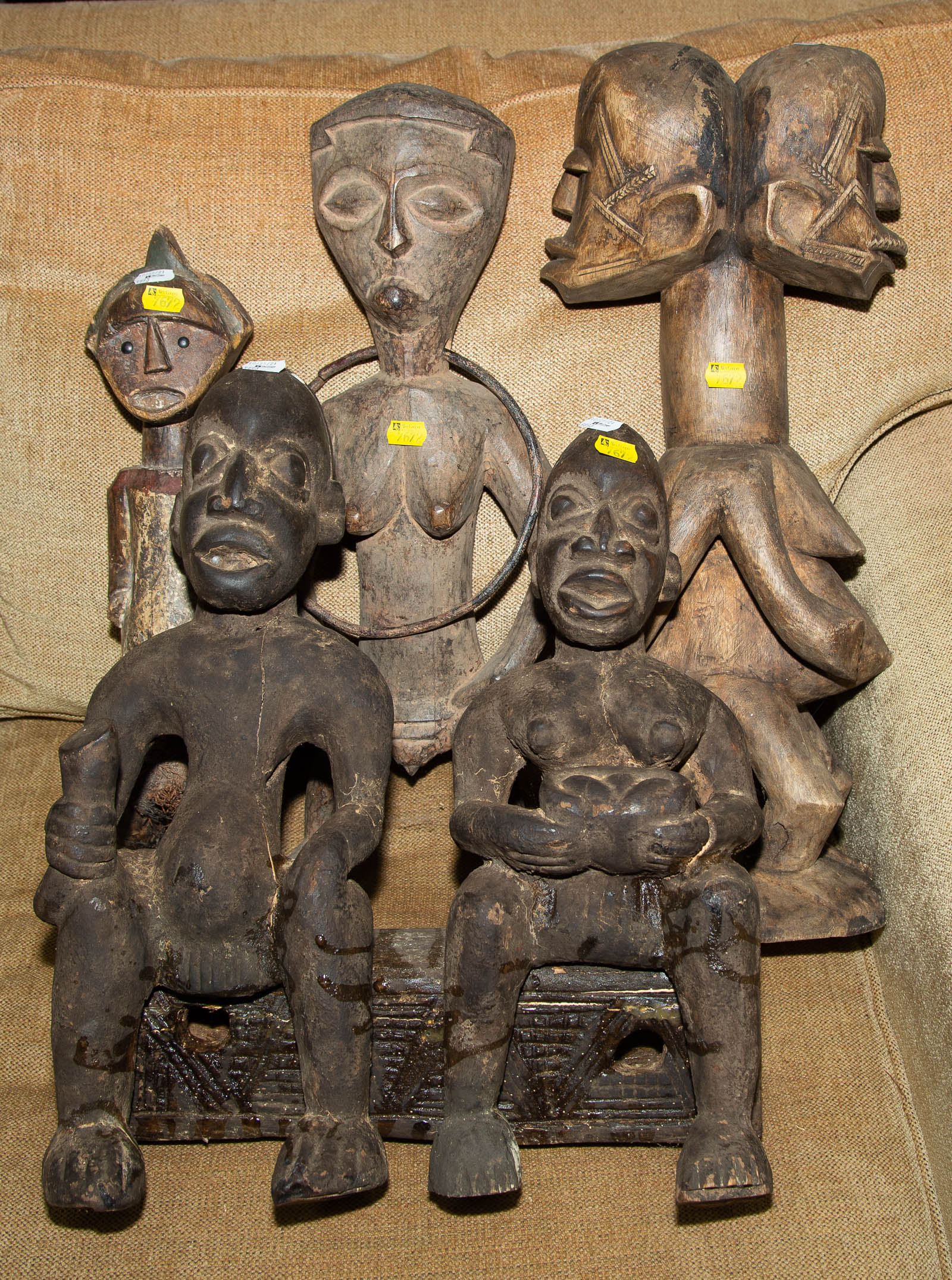 Appraisal: FOUR AFRICAN FIGURAL WOOD CARVINGS rd quarter th century Including