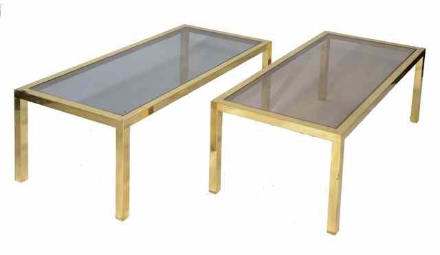 Appraisal: A PAIR OF BRASS RECTANGULAR LOW OCCASIONAL TABLES inset glass