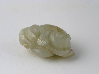 Appraisal: A Chinese pale celadon jade pendant carved as a fish