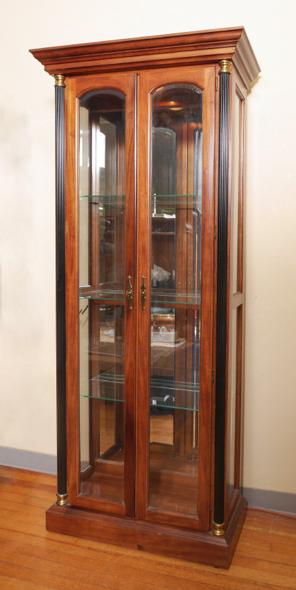 Appraisal: AMERICAN FURNITURE COMPANY LIGHTED DISPLAY CABINET Stepped pediment glass doors