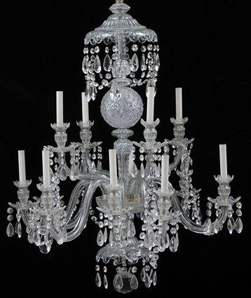 Appraisal: GEORGE III CUT-GLASS TWELVE-LIGHT CHANDELIERThe shaped canopy above a cut