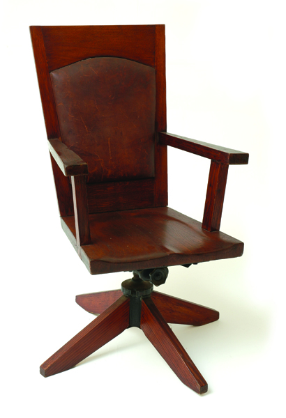 Appraisal: A WALTER BURLEY GRIFFIN OAK ARMCHAIR Circa The angular leather