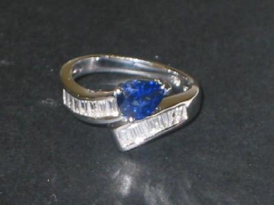 Appraisal: A SAPPHIRE AND DIAMOND RING the ct white gold crossover