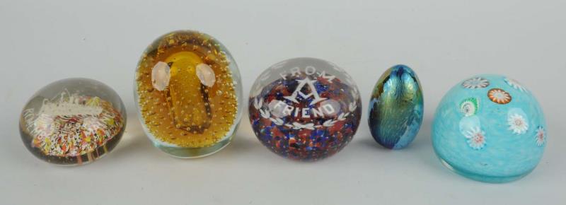 Appraisal: Lot of Glass Paper Weights One paper weight is a