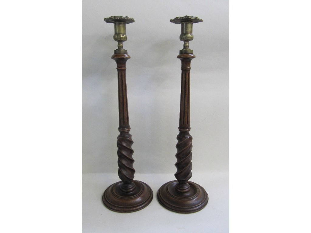 Appraisal: Pair of carved wooden candl