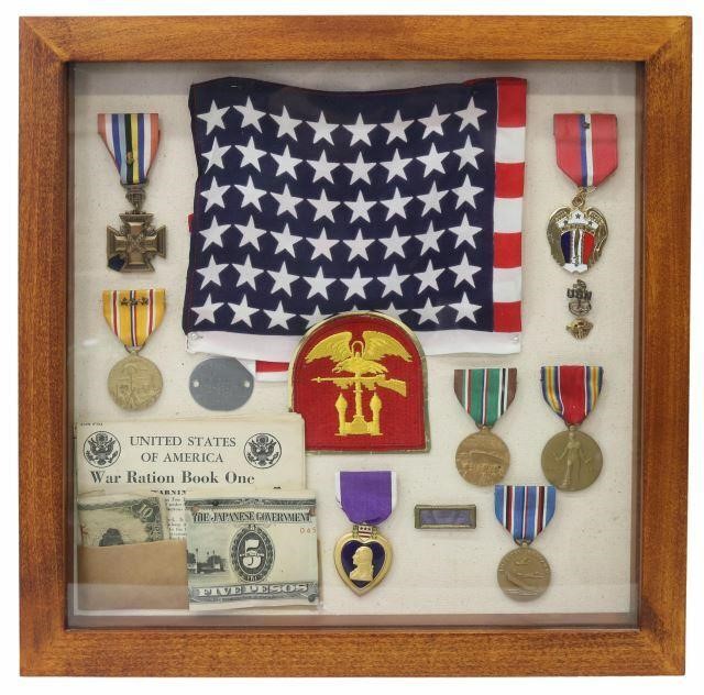 Appraisal: Framed collection of World War II medals displayed in a